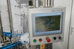 HMI Screen on the Shemesh SAMBAX-Z Complete Monoblock packer for small and extra small bottles and vials