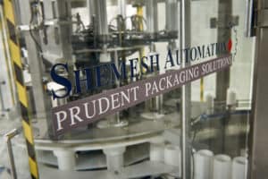 SAS120 Round Wipes Canister Loader - wet wipes packaging - Shemesh Automation